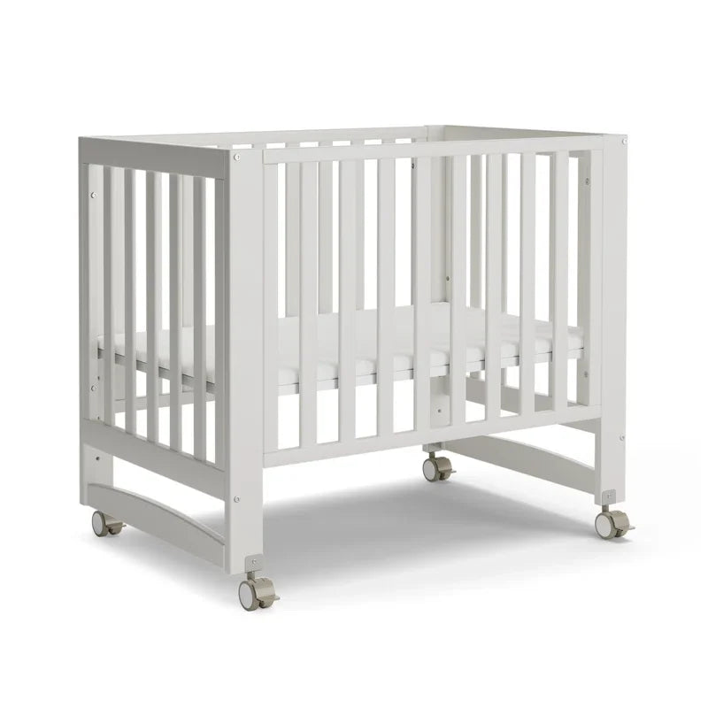 Six-In-One Portable Mini Crib With Mattress And Adjustable Height