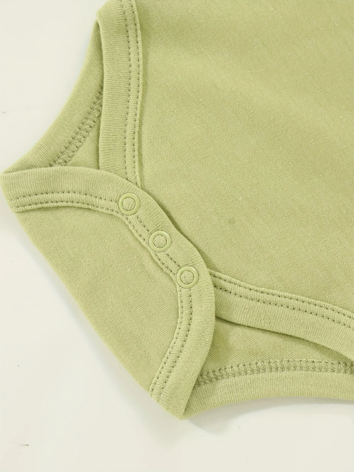 7 Piece Newborn Cotton Romper Set With Button Front Closure