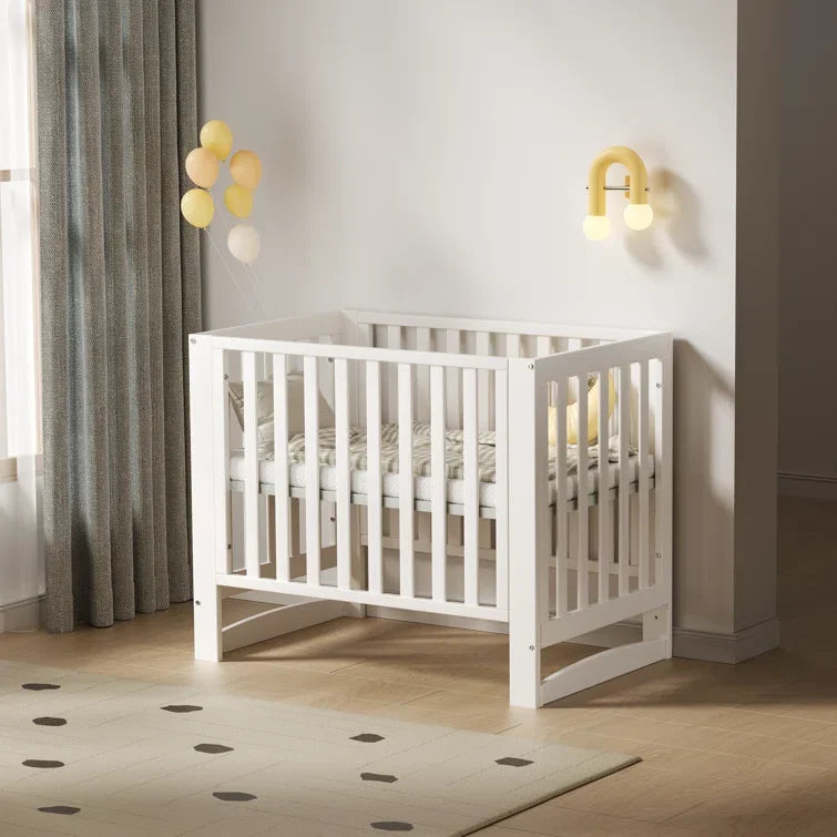 Six-In-One Portable Mini Crib With Mattress And Adjustable Height